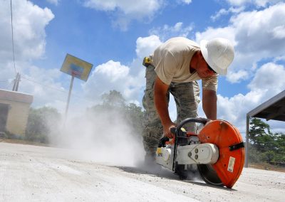 worker-using-a-concrete-hand-saw